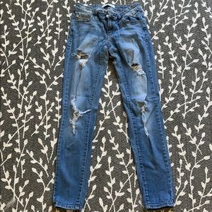 stressed, light wash jeans. Great condition!